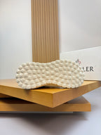 Moncler sneakers outsole view with white textured rubber tread pattern