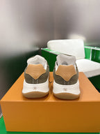 Unisex sneakers heel view in white and olive with tan back tabs and size 36