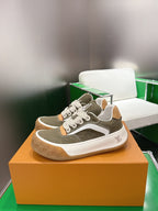 Unisex sneakers with olive uppers, white rubber sole, tan side patches, and LV logo