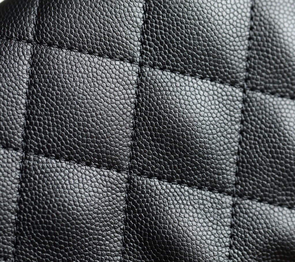 Chanel black quilted leather bag panel with stitched square pattern