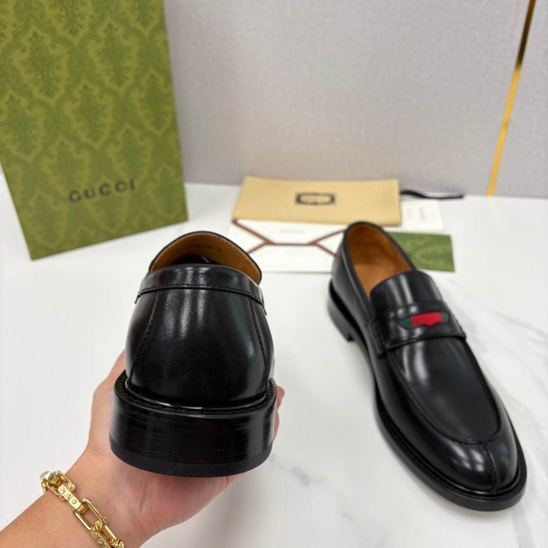Gucci black leather loafers, heel and back view with red green stripe on vamp