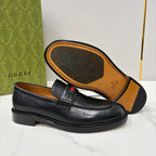 Gucci black leather loafer with brown logo-lined insole and red green stripe