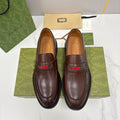 Gucci unisex leather loafers, dark brown with green-red stripe detail and black sole trim