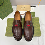 Gucci unisex leather loafers, dark brown with green-red stripe detail and black sole trim