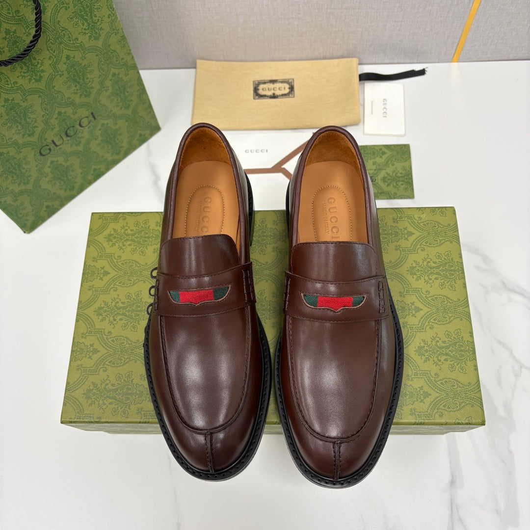 Gucci unisex leather loafers, dark brown with green-red stripe detail and black sole trim