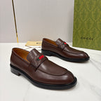 Gucci unisex leather loafers in dark brown, slip-on style with green-red stripe accents