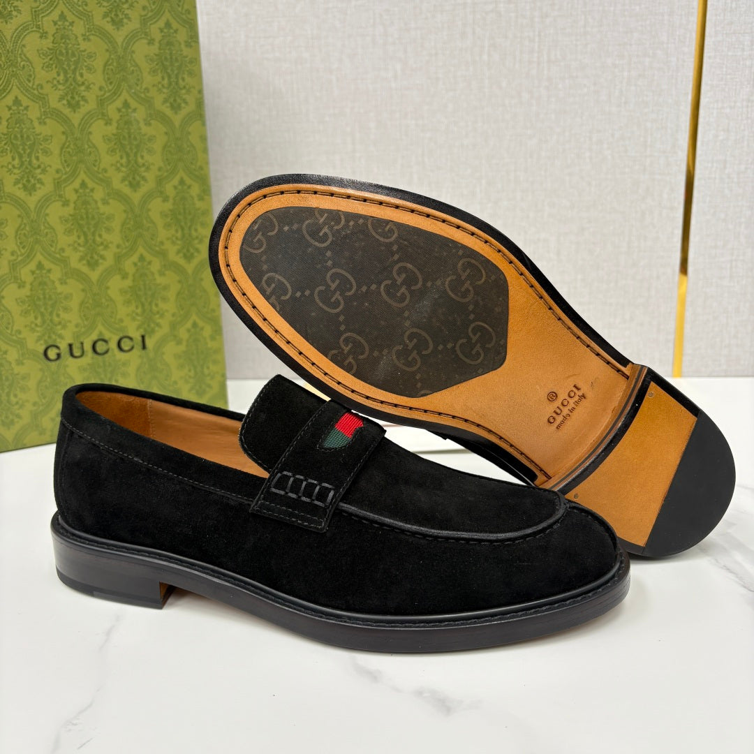 Gucci unisex black suede loafer, open view of insole and multicolor stripe.