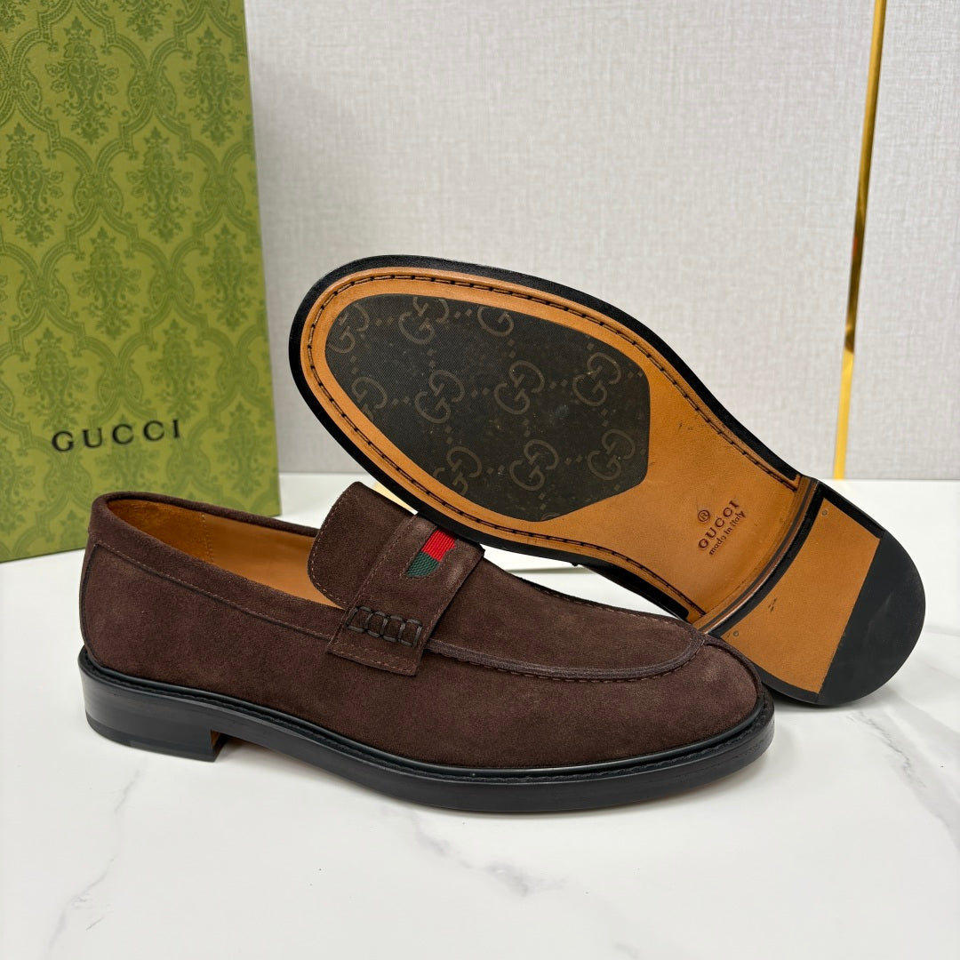 Gucci unisex suede loafers, dark brown; visible logo print on interior sole