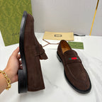 Gucci unisex suede loafers, dark brown side view with strap vamp and multicolor logo stripe