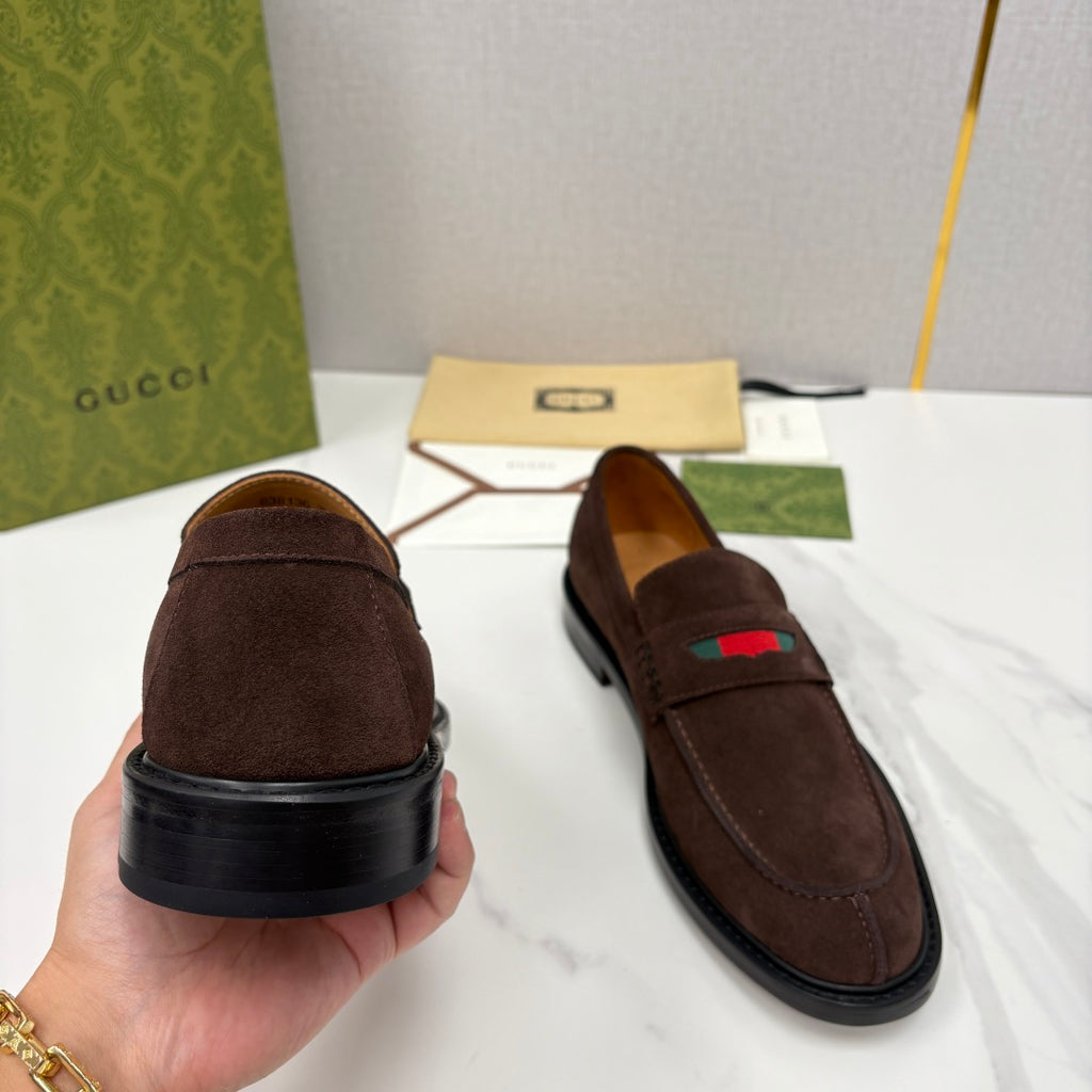 Gucci unisex suede loafers, dark brown heel view with multicolor logo stripe on vamp