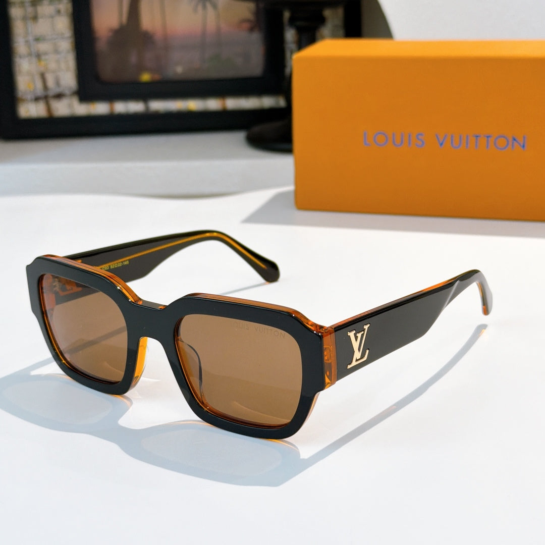 Dark sunglasses with tan lenses and LV logo on temple