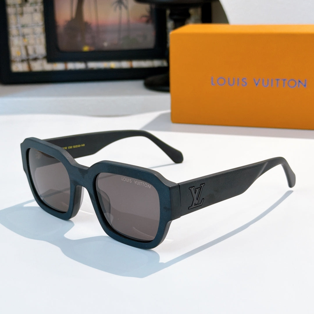 Teal sunglasses with dark lenses and LV logo on temple