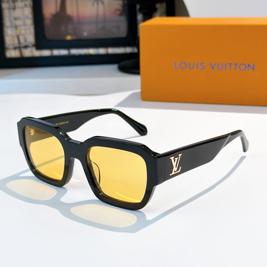 Black sunglasses with yellow-tinted lenses and LV logo on temple