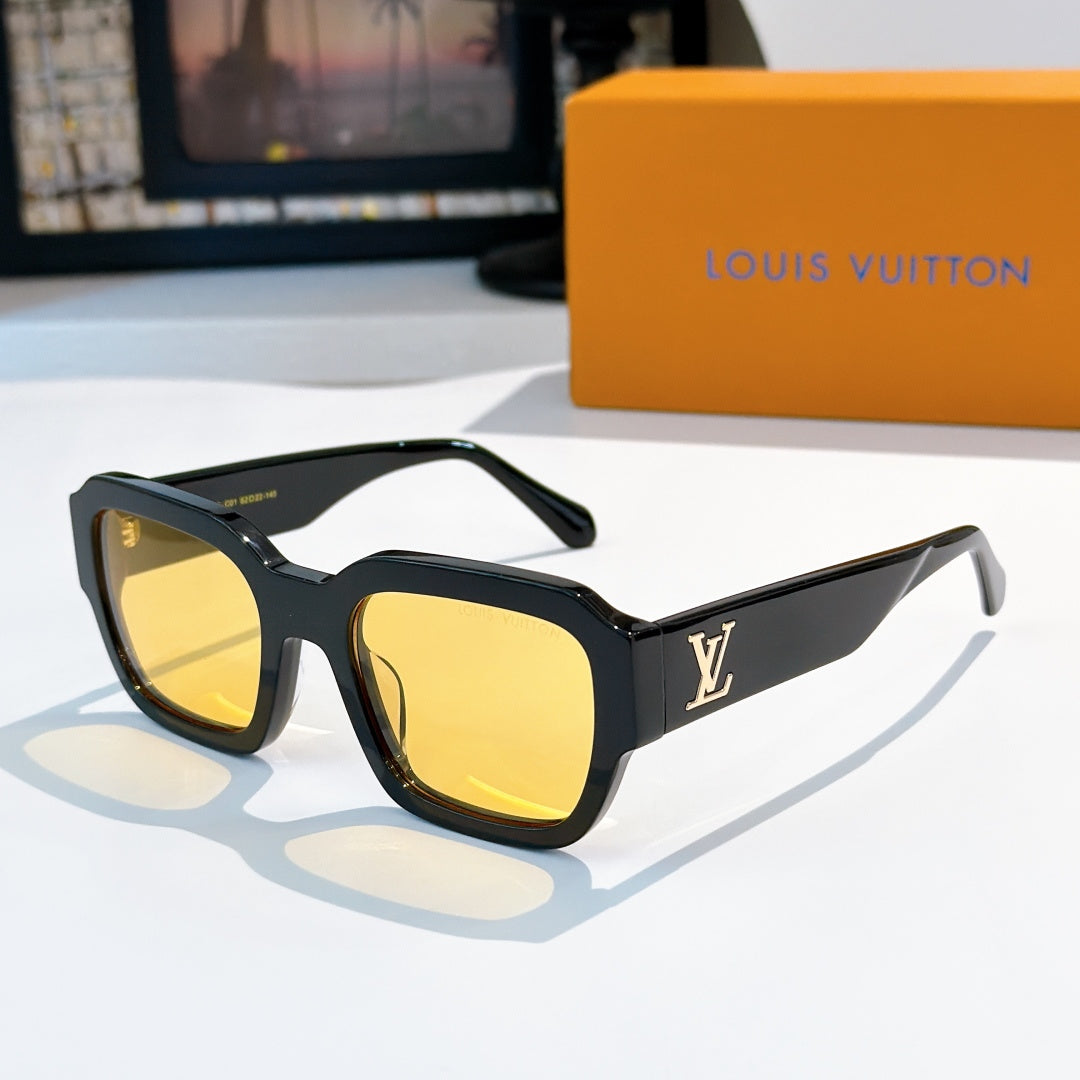 Black sunglasses with yellow-tinted lenses and LV logo on temple