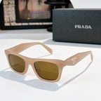 Beige square sunglasses with warm brown gradient lenses and Prada logo on temple