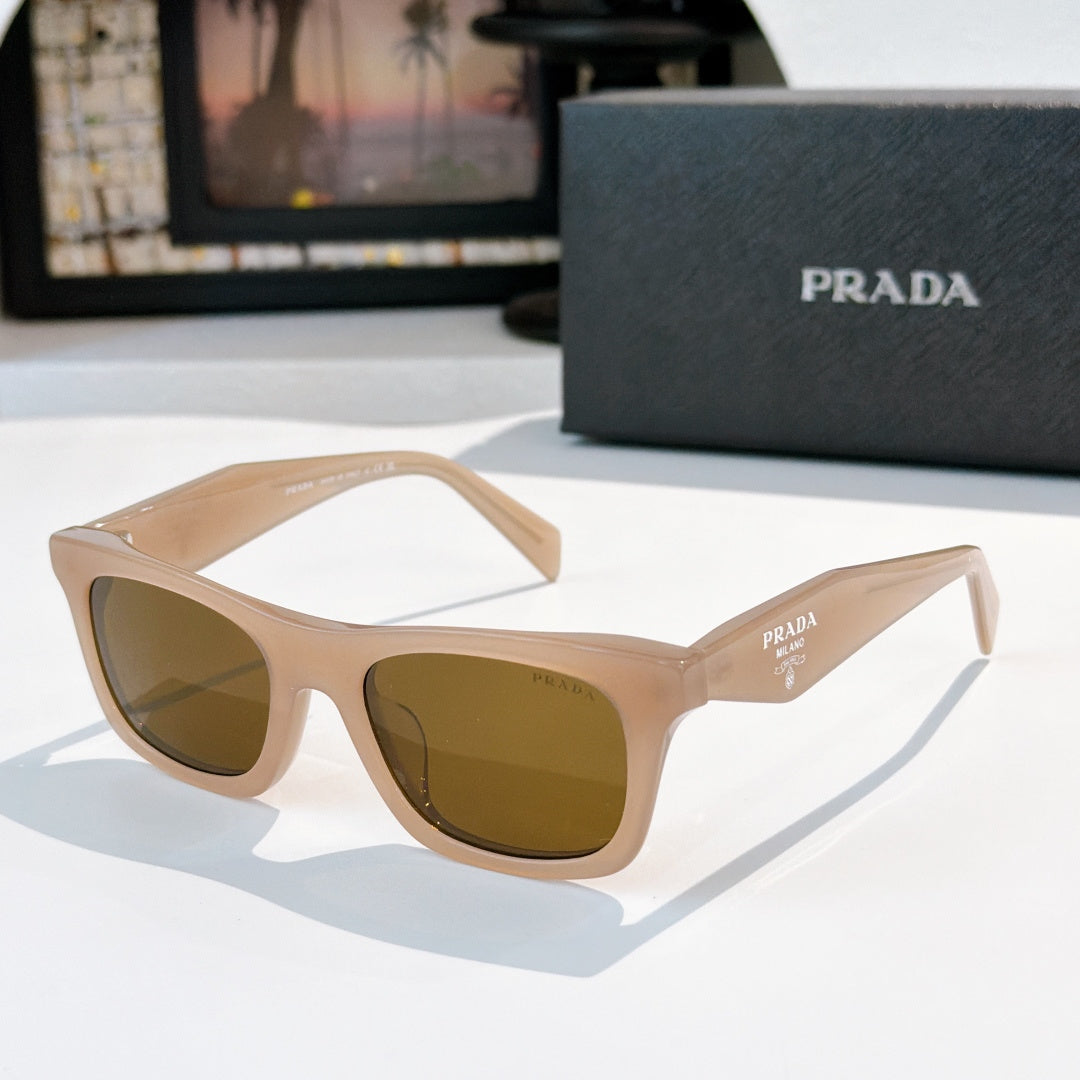 Beige square sunglasses with warm brown gradient lenses and Prada logo on temple