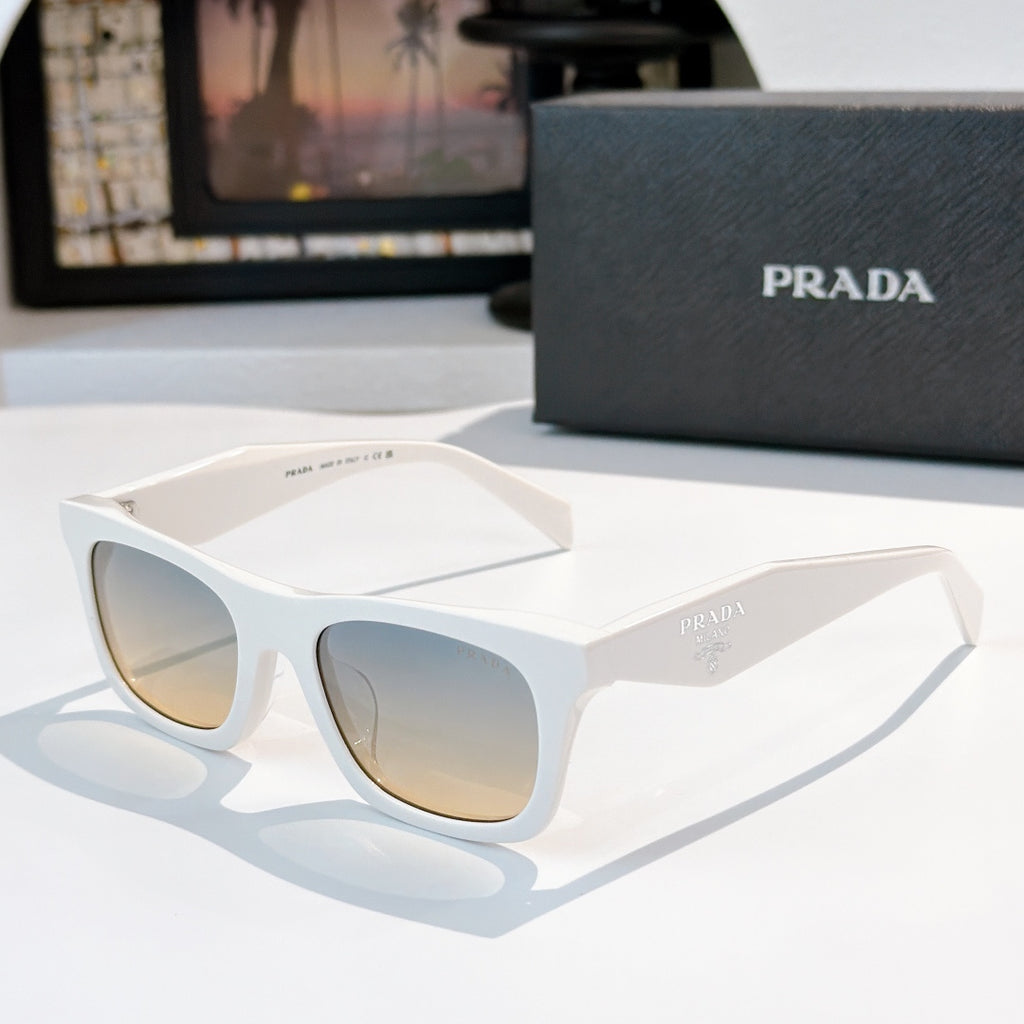 White square sunglasses with gradient lenses and Prada logo on the temple