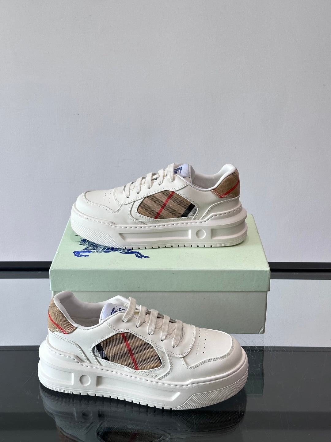 White sneakers with plaid side opening and contrast lining at collar