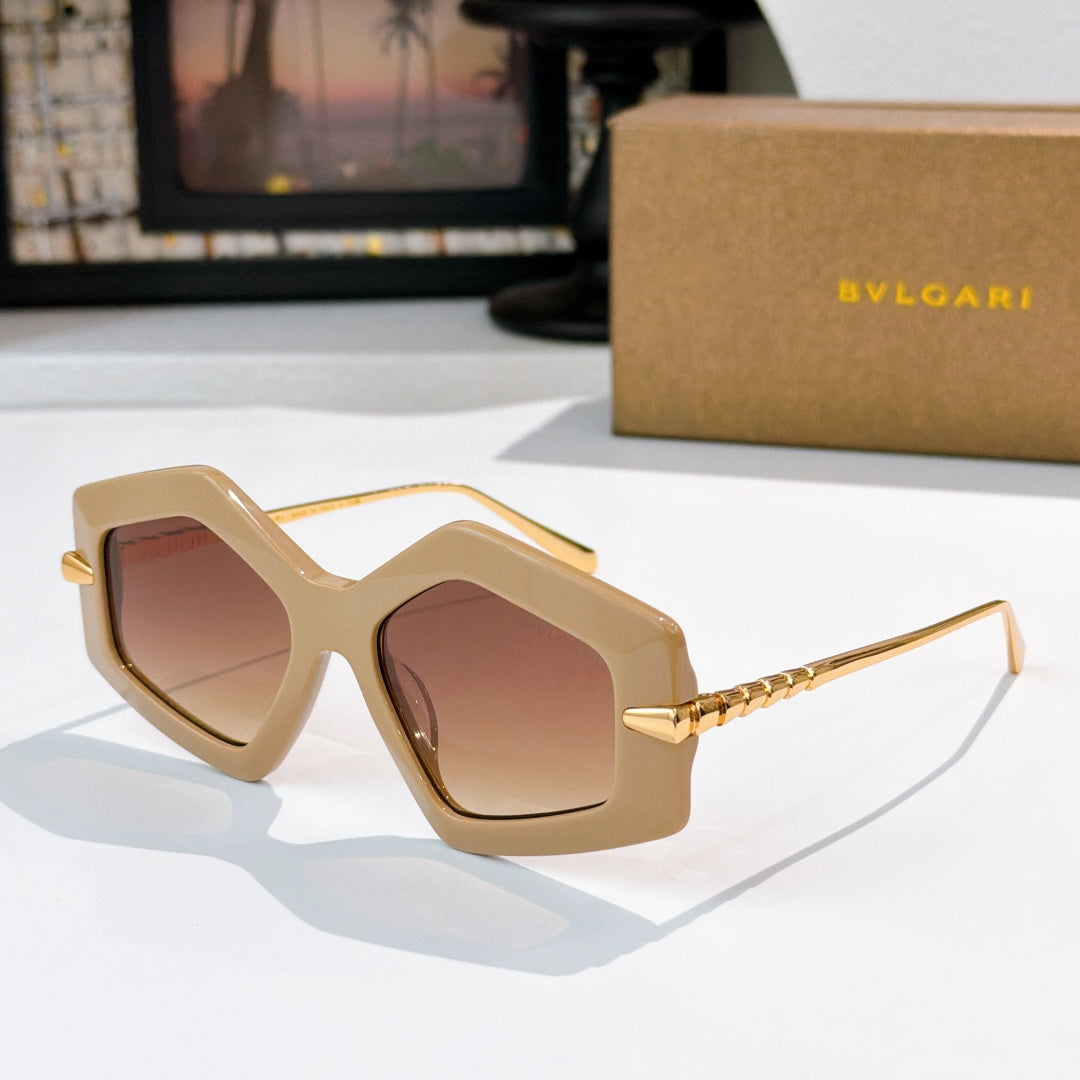 Beige octagonal sunglasses with brown gradient lenses and gold-tone temples