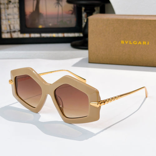 Beige octagonal sunglasses with brown gradient lenses and gold-tone temples
