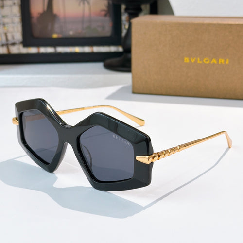 Black octagonal sunglasses with dark gray lenses and gold-tone temples