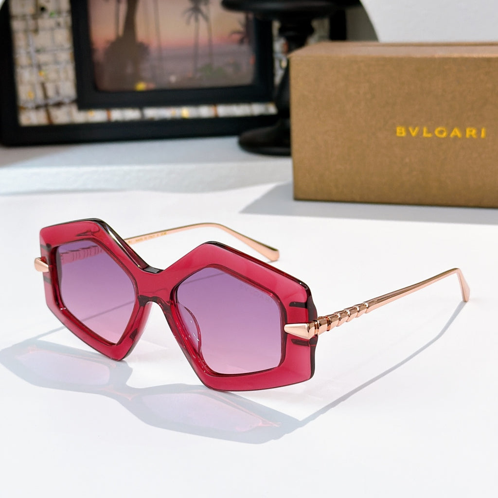 Red octagonal sunglasses with purple gradient lenses and rose gold-tone temples