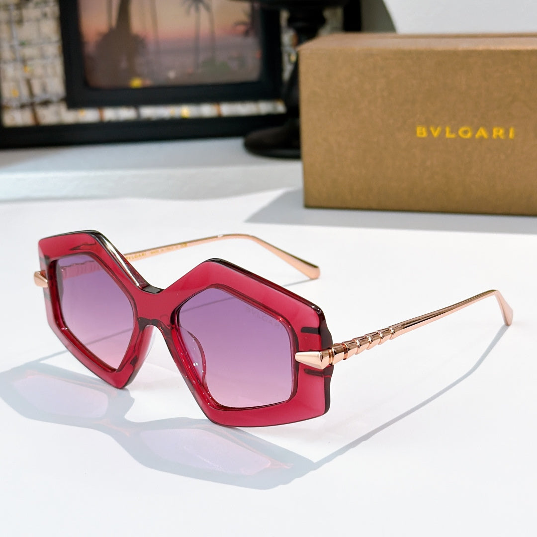 Red octagonal sunglasses with violet lenses and gold-tone temples