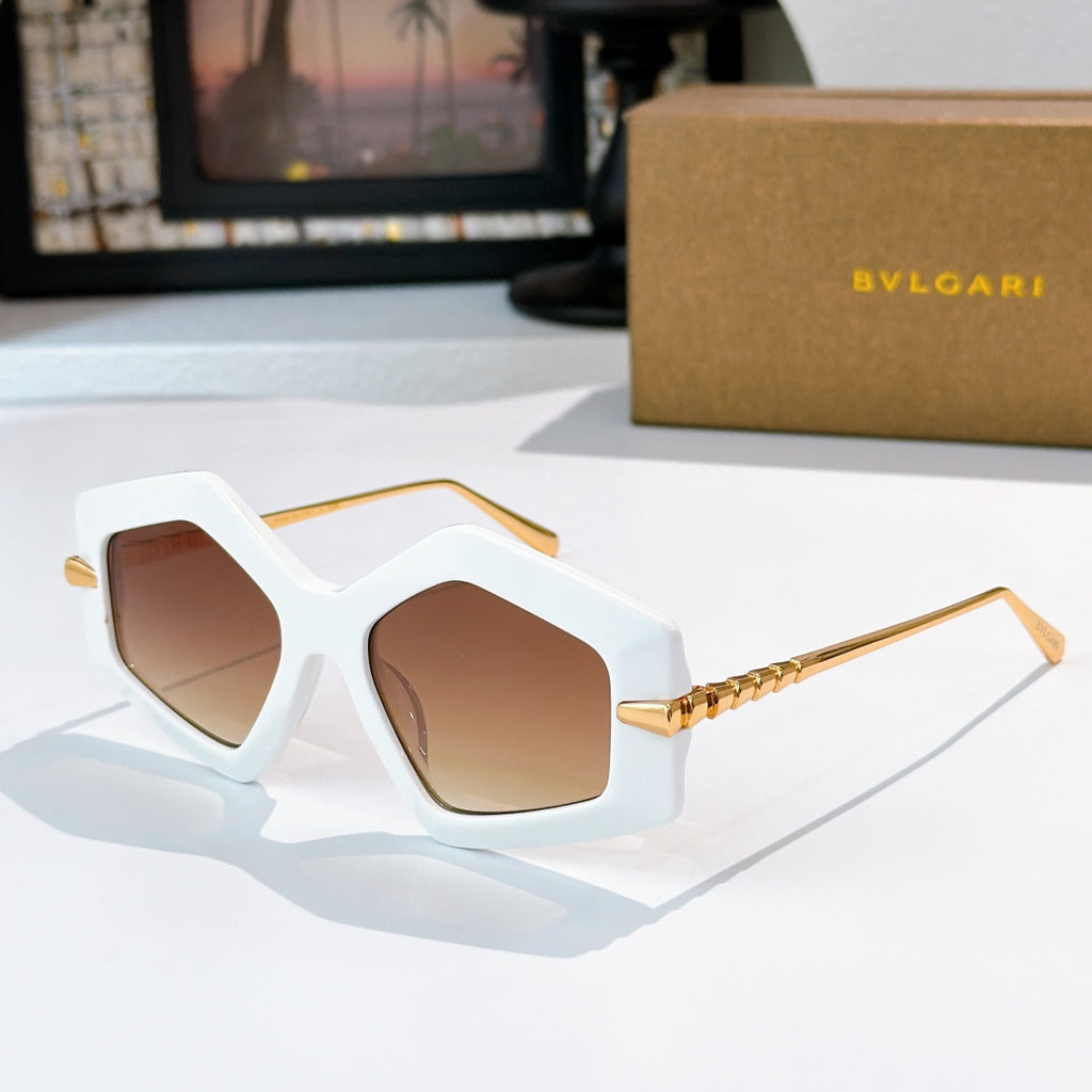White octagonal sunglasses with brown gradient lenses and gold-tone temples
