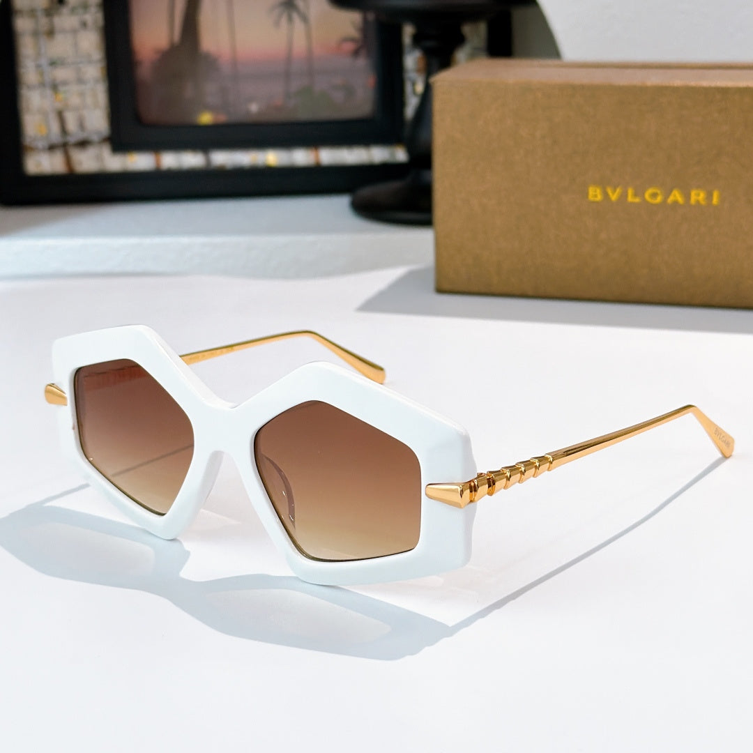 White octagonal sunglasses with brown gradient lenses and gold-tone temples