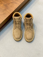 Suede lace-up ankle boots with beige laces and light rubber sole.