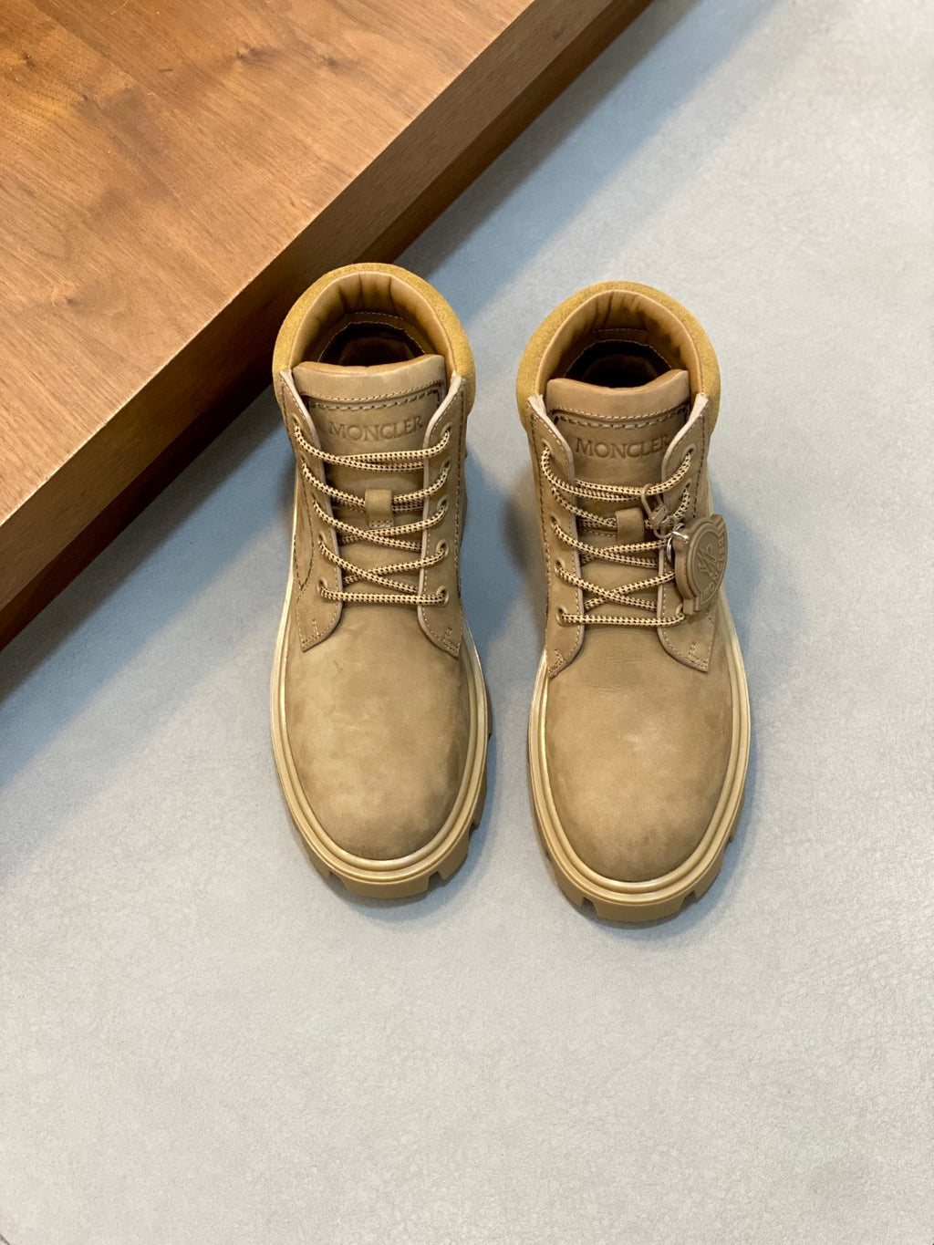 Suede lace-up ankle boots with tan laces and chunky light rubber sole