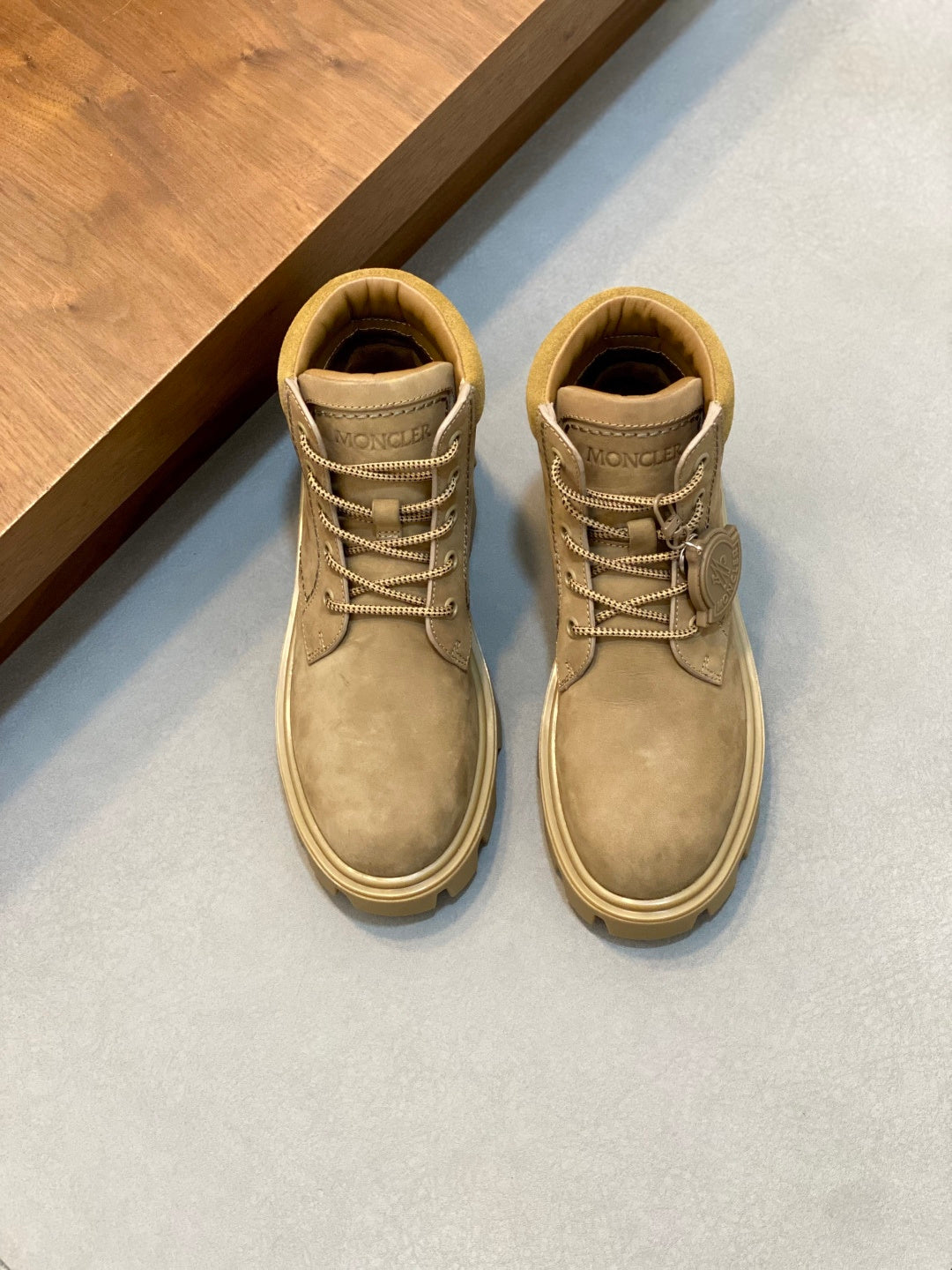 Suede lace-up ankle boots with tan laces and chunky light rubber sole