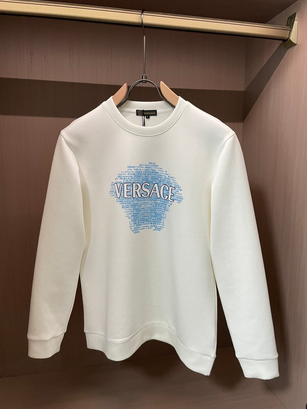 White crewneck sweatshirt with blue Versace graphic front