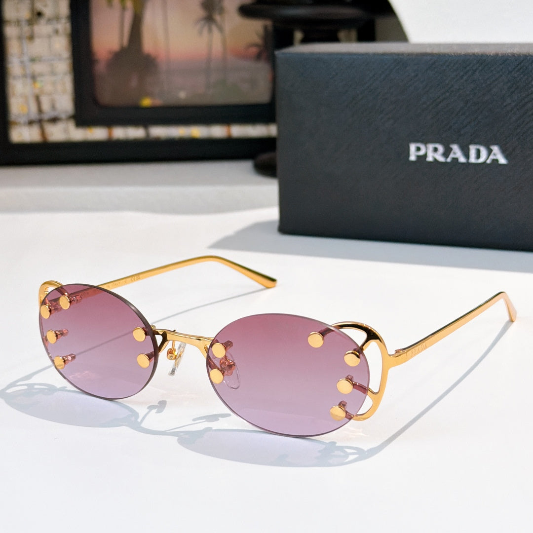 Prada sunglasses with round purple lenses and gold-tone studded frame, slim metal arms