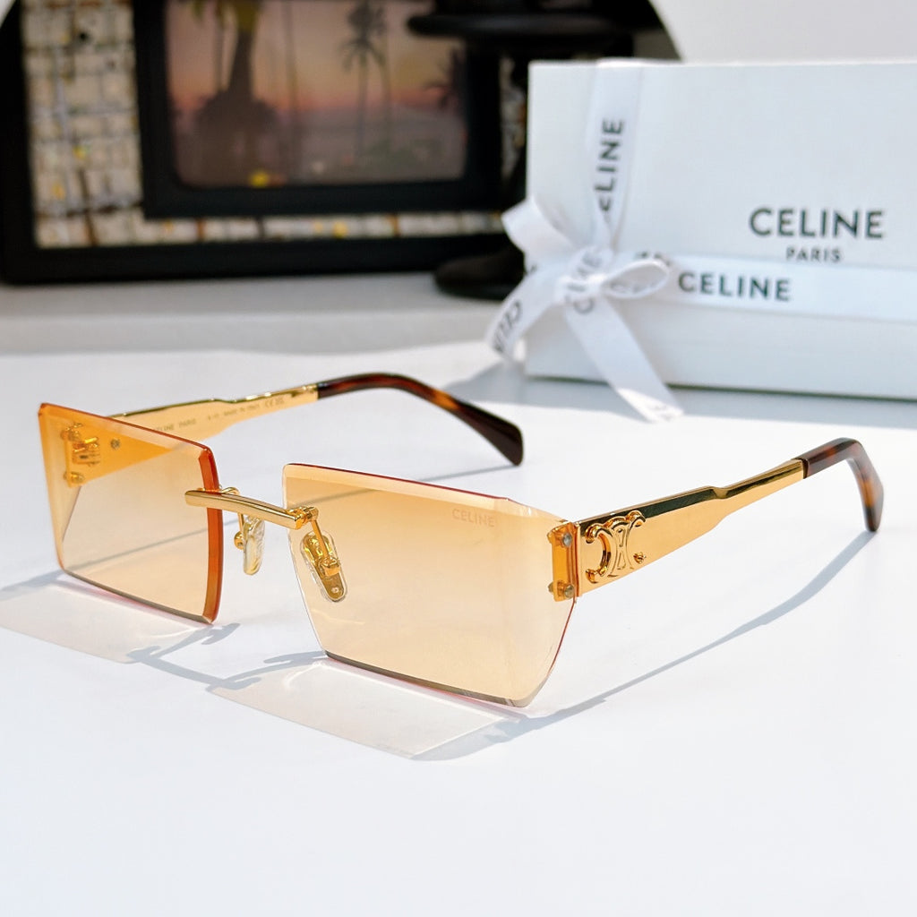 Rectangular Celine sunglasses with amber lenses, orange-brown frame, gold trim