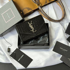 Black small leather bag with croc texture and gold SAINT LAURENT YSL logo