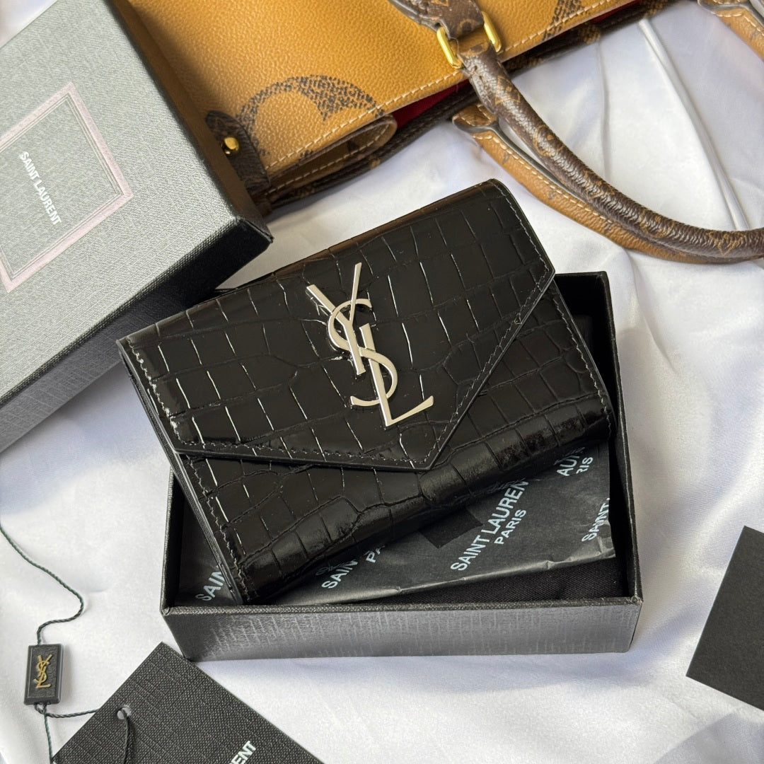 Black croc-textured small leather bag with gold YSL logo on flap