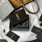 Black small bag with croc texture and gold YSL logo
