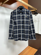 Navy plaid long-sleeve button-up shirt with pointed collar and front buttons