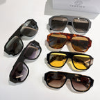 Assorted cat-eye sunglasses set with black, tortoise, and yellow-tinted lenses