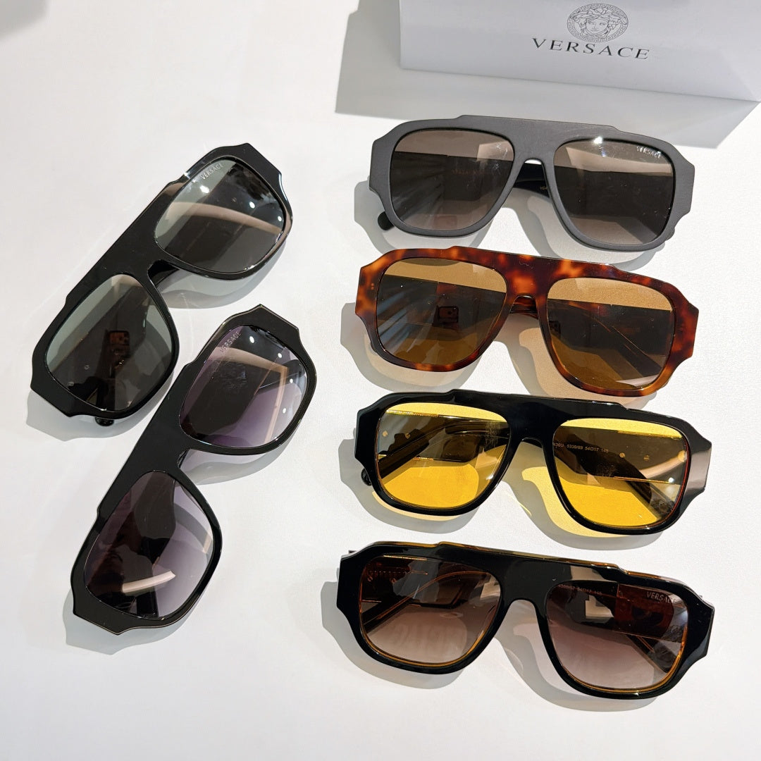 Assorted cat-eye sunglasses set with black, tortoise, and yellow-tinted lenses