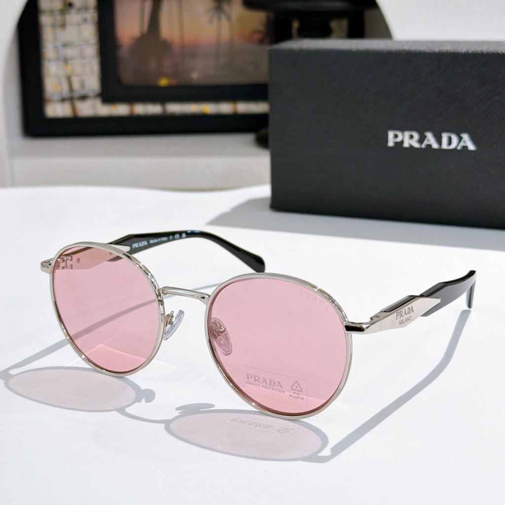 Prada sunglasses with silver metal round frames and pink tinted lenses