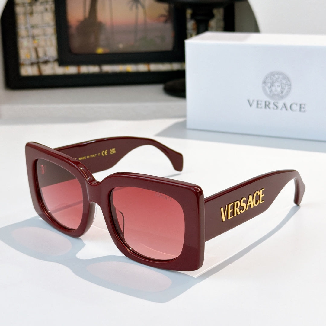 Versace sunglasses, burgundy square frames with tinted lenses and VERSACE logo on temple