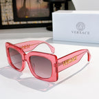 Versace sunglasses, pink cat-eye frames with tinted lenses and logo on the temple
