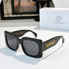 Versace sunglasses, black square frames with dark tinted lenses and VERSACE logo on temple