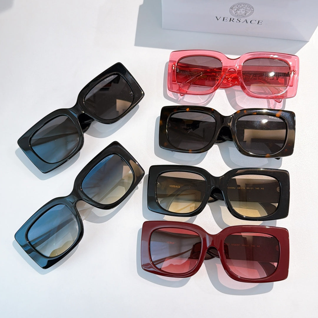Versace sunglasses assortment with black, blue, and red square frames and tinted lenses