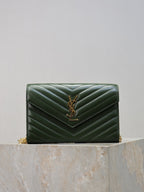 Quilted green leather clutch with YSL logo, chevron stitching, and gold-tone chain strap.