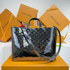 Men’s Louis Vuitton tote bag with long strap and monogram pattern, dark finish.