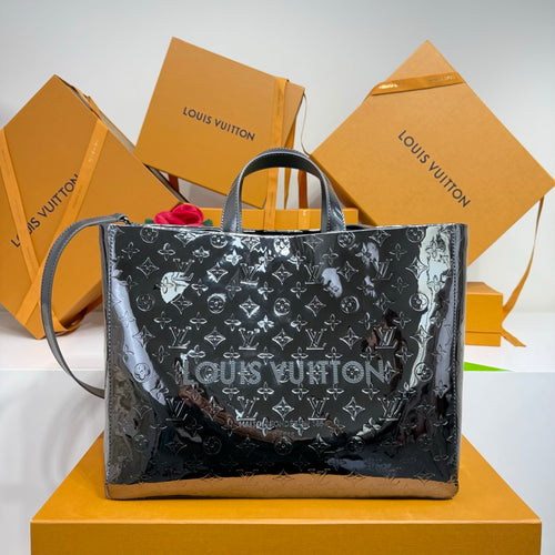 Men’s Louis Vuitton tote bag with top handles and monogram pattern, dark finish.