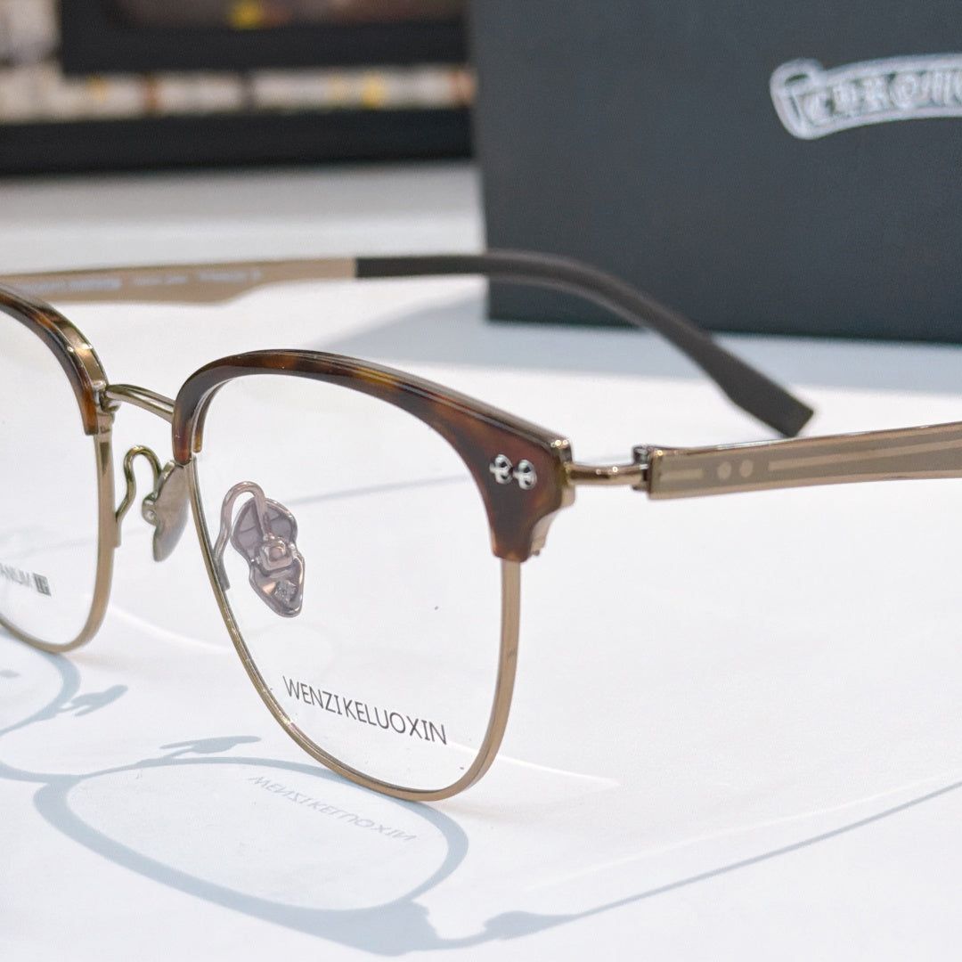 Brown eyeglass frames with clear lenses and metal bridge detail